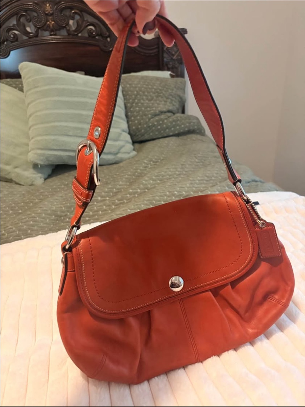 Classic Orange Leather Shoulder Bag with Polished Hardware